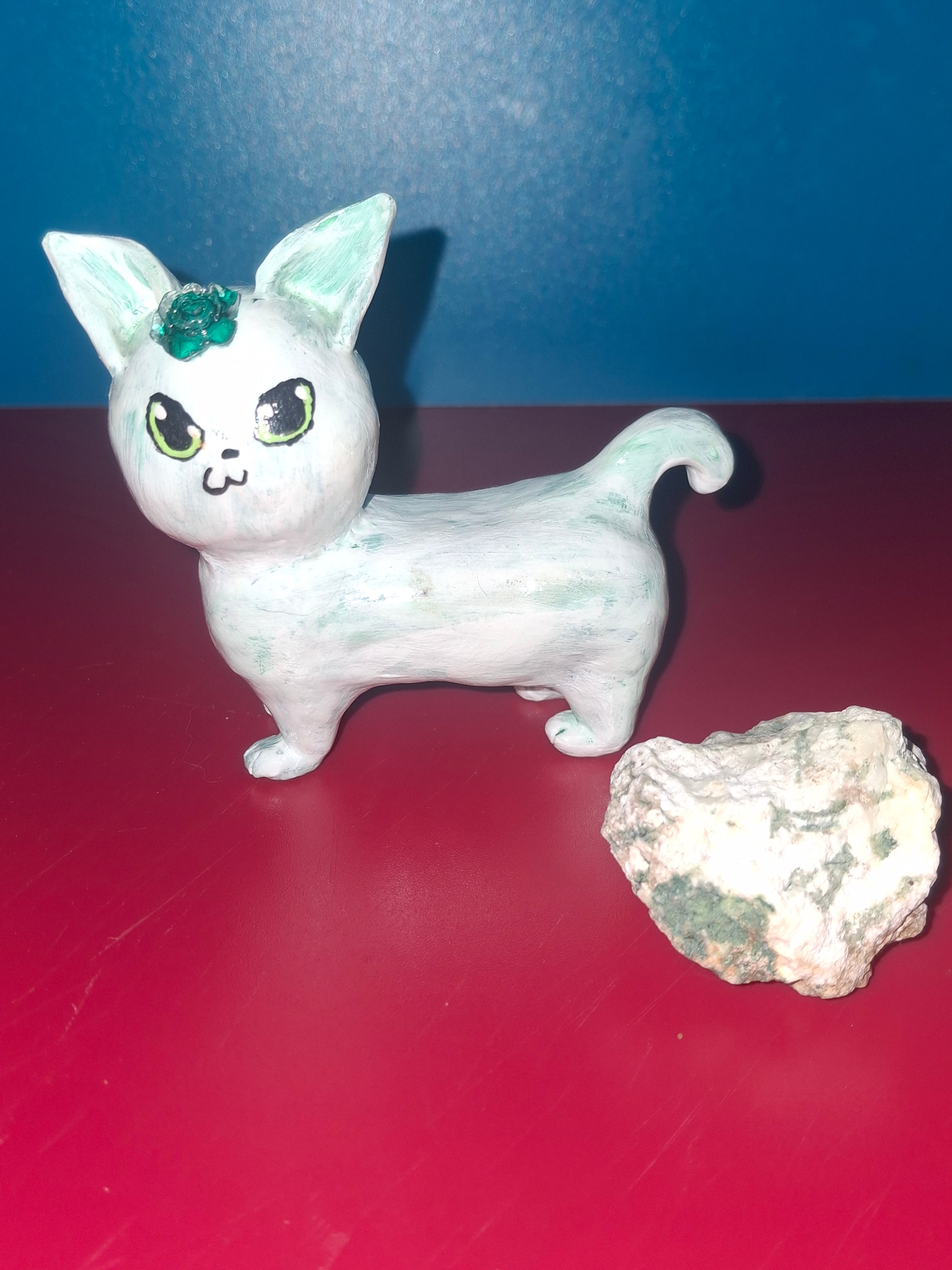 white/green cat