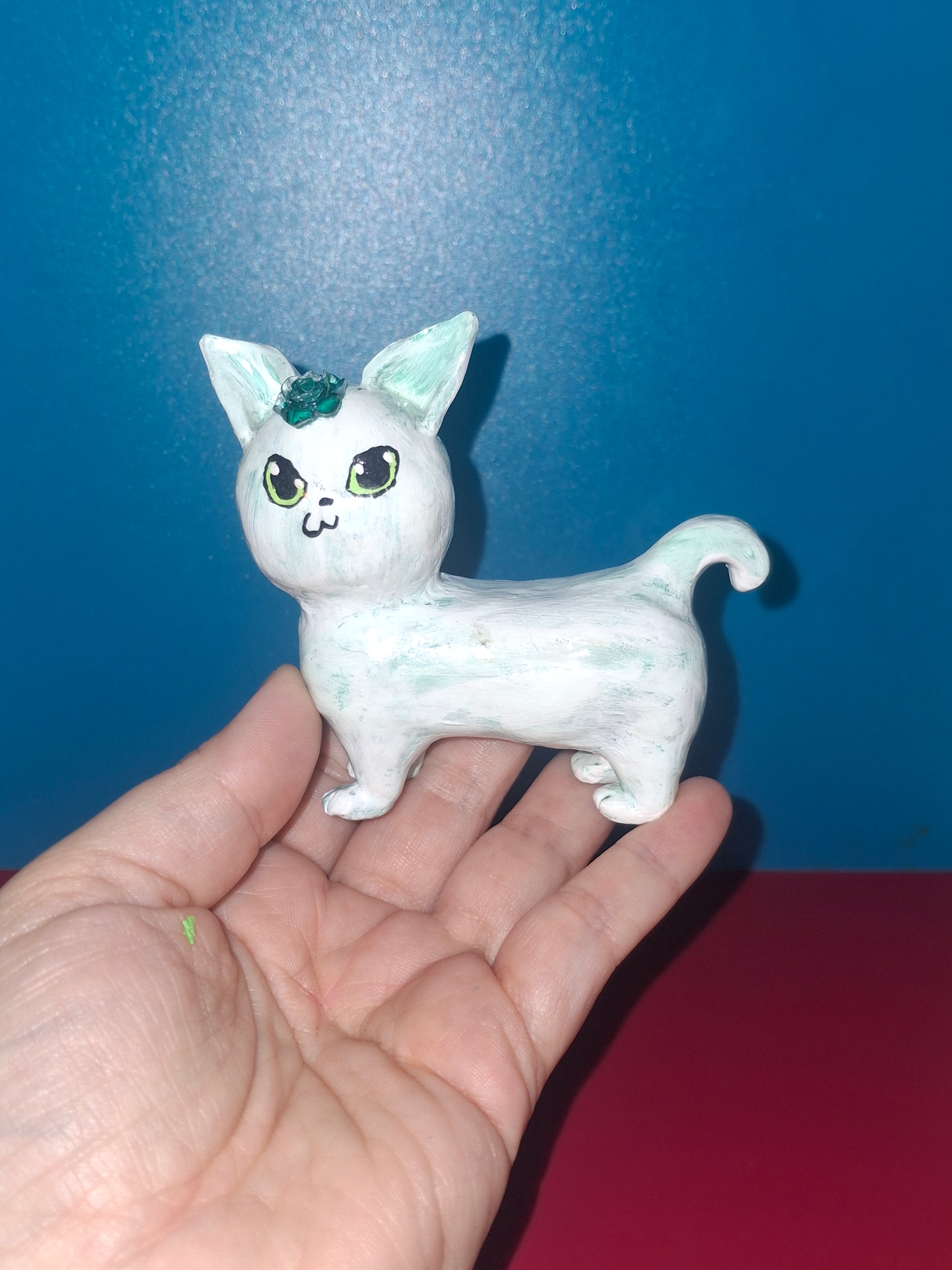 white/green cat